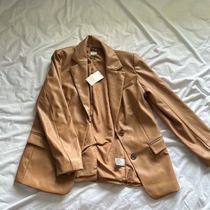Woman’s faux leather blazer/jacket